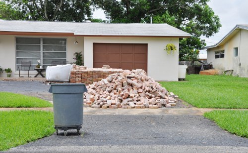 Professional team clearing a cluttered garage